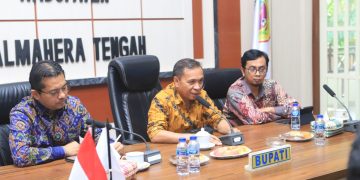 Pj Bupati Ikram M Sangadji Hadiri Kegiatan High Level Meeting TPID dan TP2DD