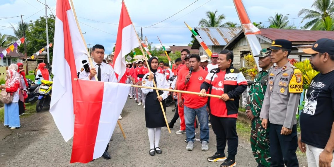 Ketua Komisi III DPRD Tikep Lepas Peserta Kirab Merah Putih di Payahe