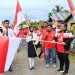 Ketua Komisi III DPRD Tikep Lepas Peserta Kirab Merah Putih di Payahe