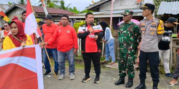 Semangat Persatuan Meyambut HUT RI Ke 80 Tahun, Pemuda RT 007 Kelurahan Payahe dan Mahasiswa Kubermas Unkhair Ternate Gelar Kirab Merah Putih 